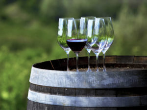 wine glasses on barrel